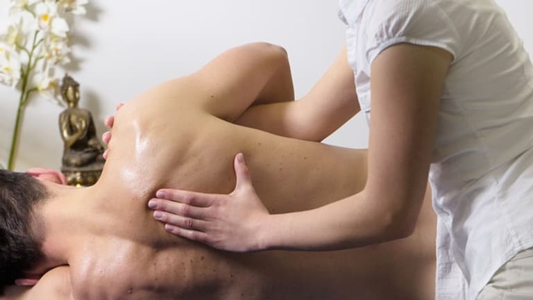 Couple,Massage.,Two,Men,Doing,Back,Massage,To,Two,Women. - Cloud 9 Massage